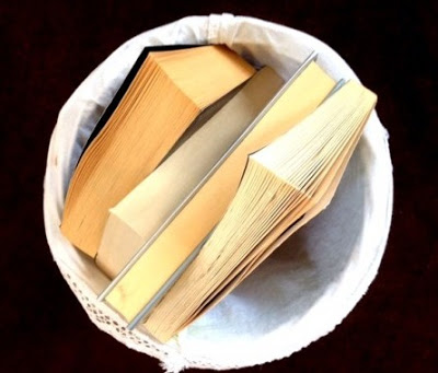 books in trash