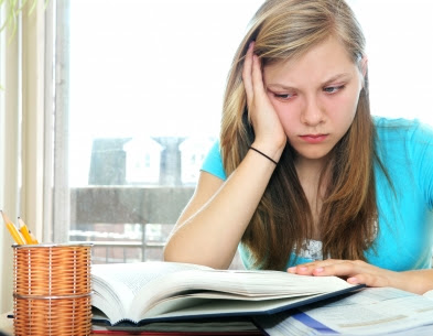unhappy teenager reading