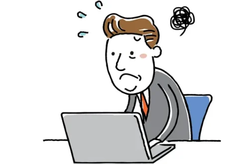man frustrated at computer