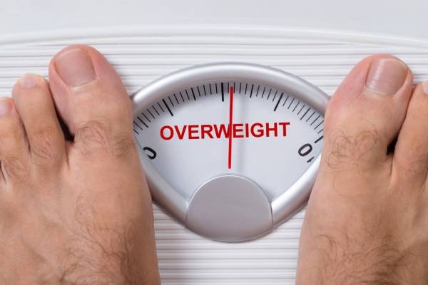 scale feet overweight