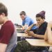 student on phone in class